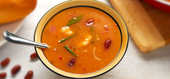 Red bean and tomato soup with maggi thai soup mix served in bowl