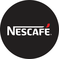 Nescafé brand logo in white and red colors on a black circular background.